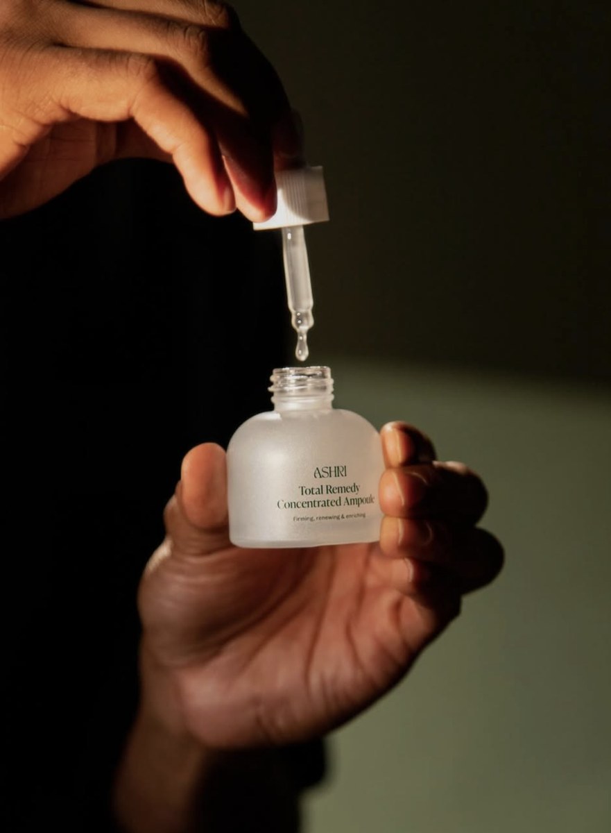 ASHRI ampoule with a falling drop of serum