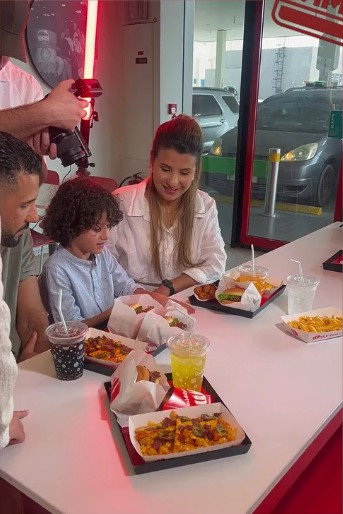 On set at Wimpy: a family shares the Eid meal