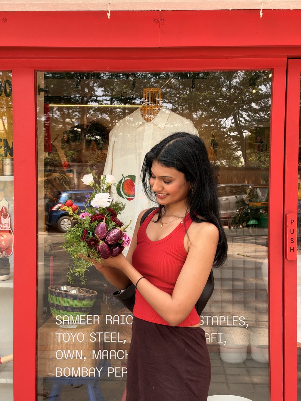 Loveleen with a vegetable bouquet outside General Items